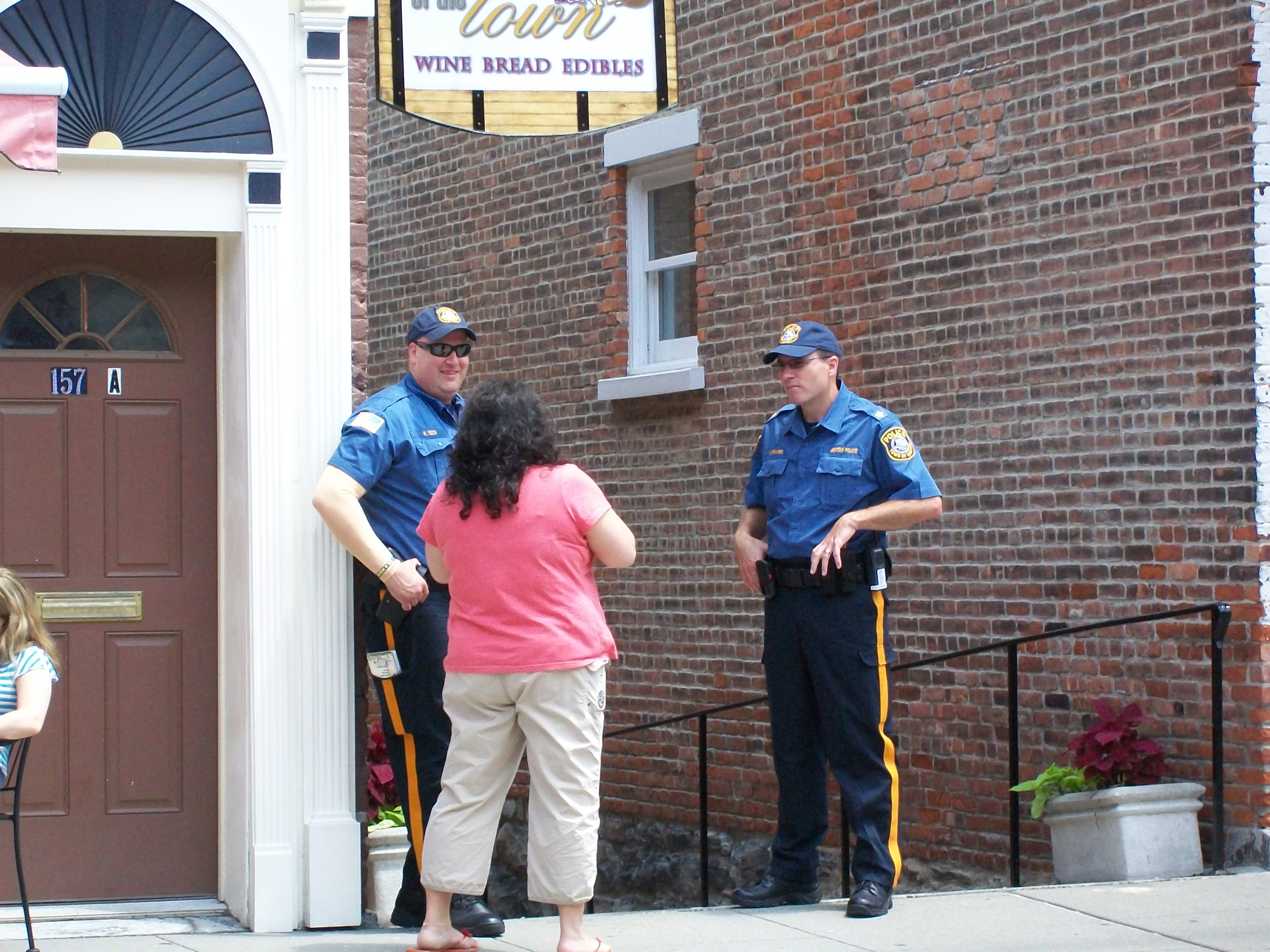 Deputy Mayor Le Frois chatting with Ptl. Teets and Chief Richards on Spring Street