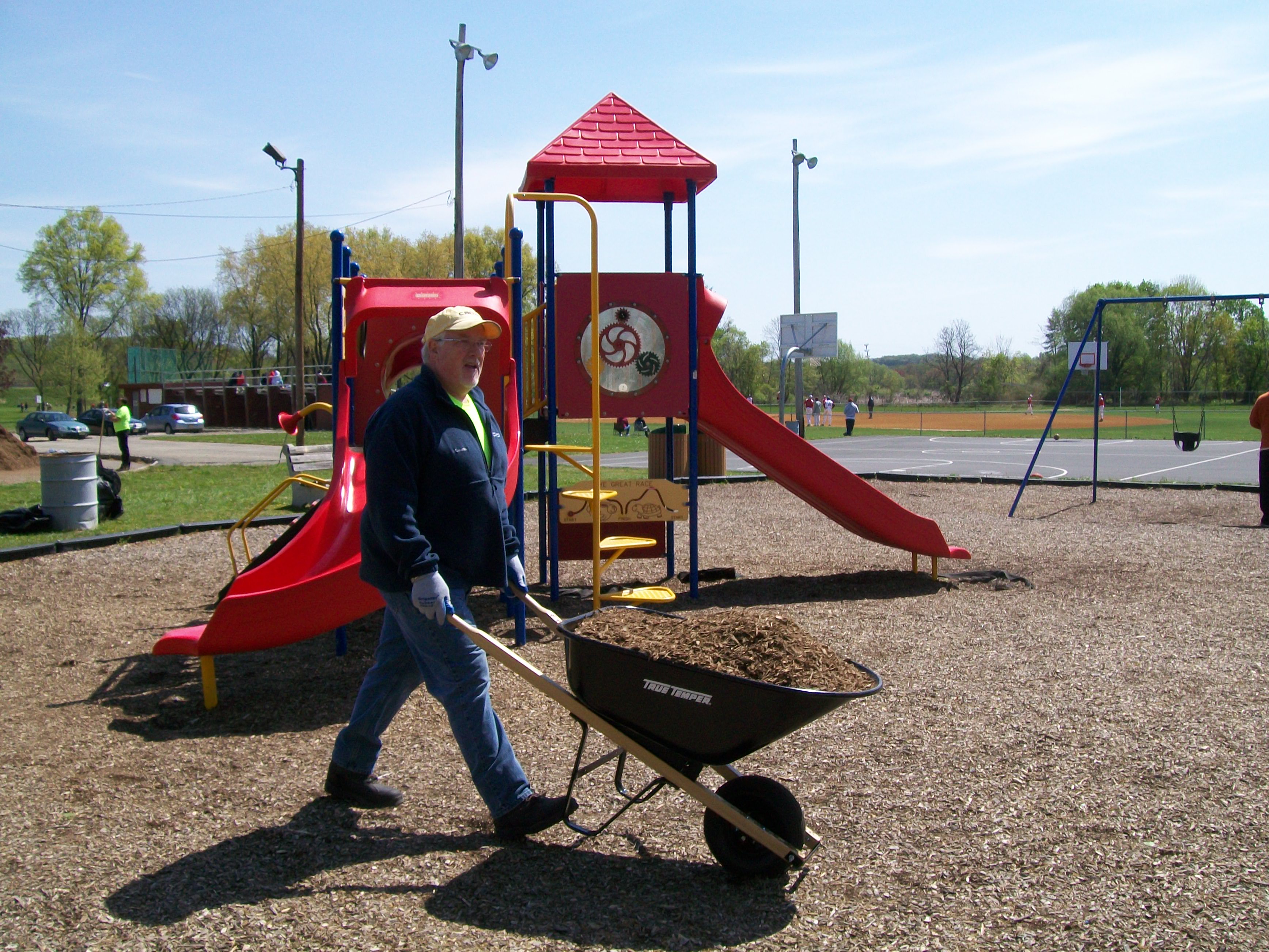 Spreading mulch at Memory Park